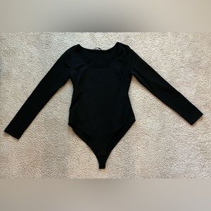 Black cotton long sleeved body suit, size L